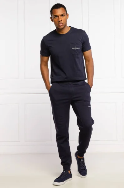Sweatpants OFF PLACED ICONIC | Regular Fit CALVIN KLEIN JEANS navy blue