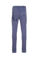 Spodnie dresowe Guess niebieski
