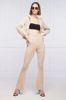 Spodnie dresowe FREYA | flare fit Juicy Couture beżowy