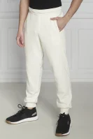 Spodnie dresowe | Regular Fit Calvin Klein kremowy